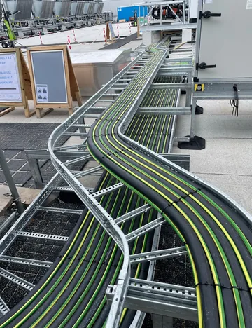 Power cable dressed into ladder and tray